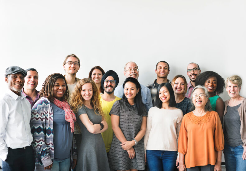 A group of people, diverse in age and ethnicity