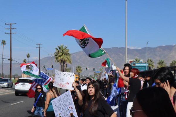 Student outside of the San Jacinto High School, during a walkout